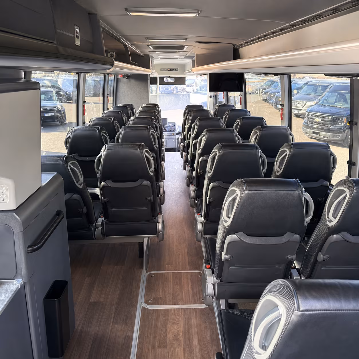 Rent a Bus to Acrisure Bounce House